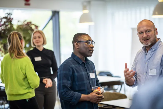 Profile area members in discussion.Photo Johan Persson.
